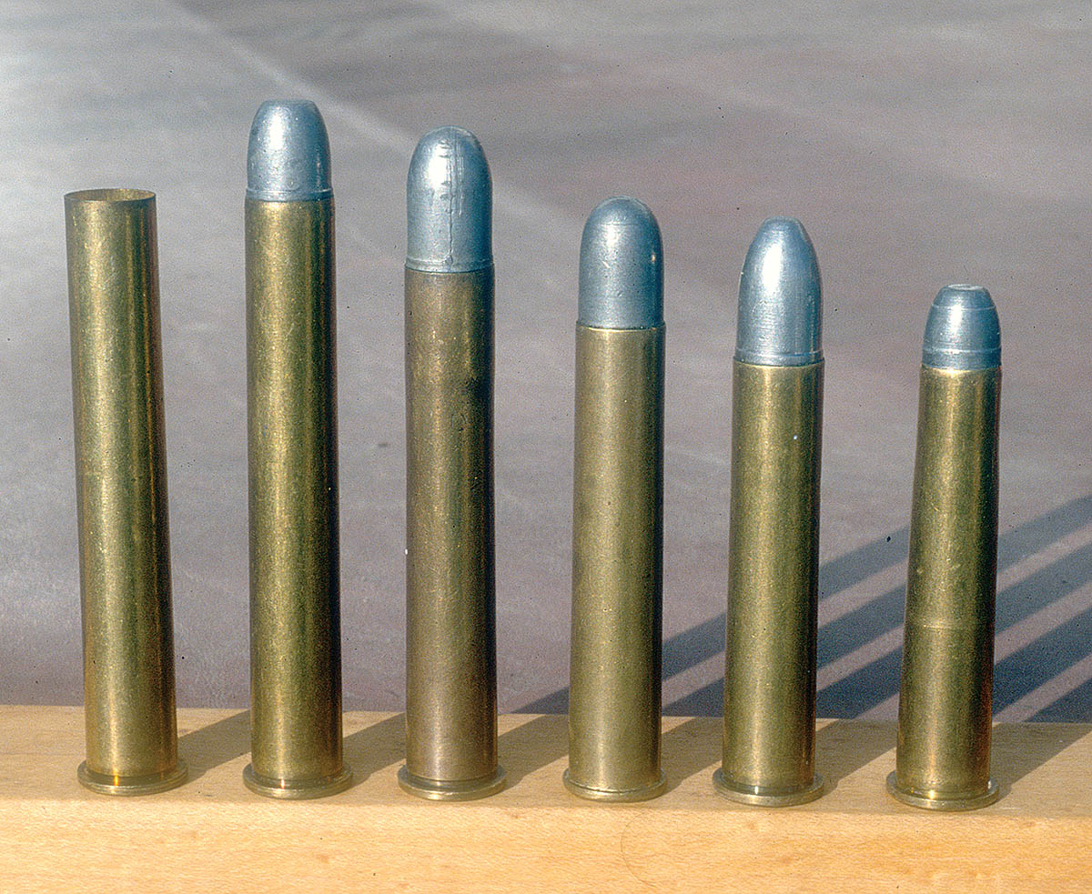The primary manner in which early black-powder cartridges were made more powerful was to increase their length. From left to right: .45 basic case, .45-31⁄4 Inch (.45-120), .45-27⁄8 Inch (.45-110), .45-26⁄10 Inch (.45-100), .45-24⁄10 Inch (.45-90) and a .40-82 (also 24⁄10-inch case).